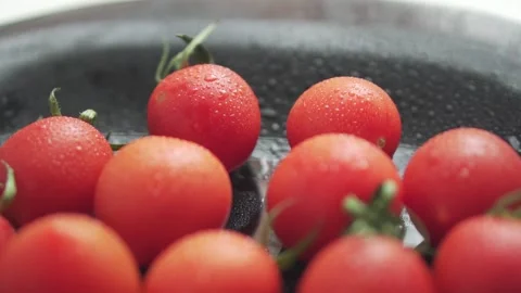 Red cherry fresh tomatoes close up slow motion. Stock Footage 133344822