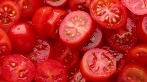 Red cherry tomato slices, rotation in circle. slice tomato, Turning Stock Footage 241924846