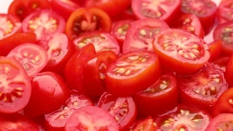 Red cherry tomato slices, rotation in circle. slice tomato, Turning. Stock Footage 242705903