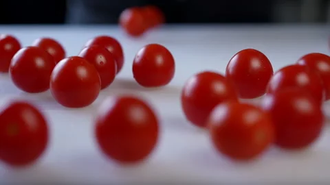 Red Cherry Tomatoes Beautifully Arranged Neatly on a Clean White Surface Stock Footage 296631386