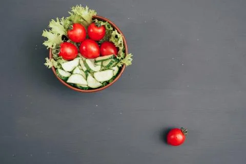 Red cherry tomatoes on dark background many Foto stock