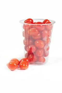 Red cherry tomatoes in plastic packaging 스톡 사진