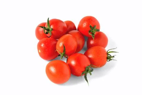 Red cherry tomatoes with water drops on white background, isolate, close-up Stock Photos