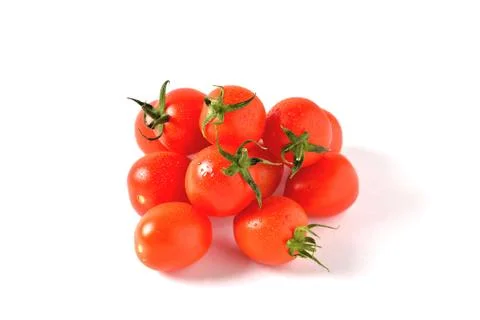 Red cherry tomatoes with water drops on white background, isolate, close-up Stock Photos