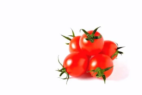 Red cherry tomatoes on white background, isolate, close-up Foto stock