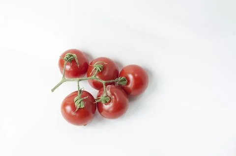 Red cherry tomatoes on a white background isolated on a white background Stock Photos