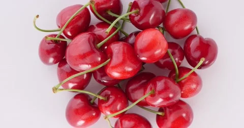 Red Cherry on White Background Top View Video stock 132378713