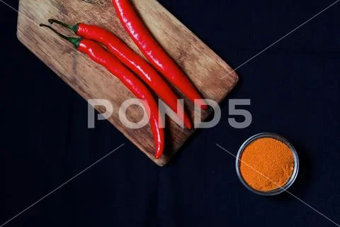 Red chile pepper paprika powder cooking ingredient vegetarian vegetable Stock Photos