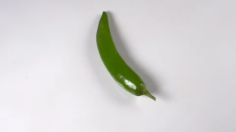 Red chili or chilli cayenne pepper isolated on white background cutout Stock Footage 125572231