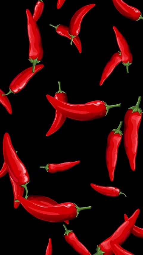 Red Chili Peppers Falling Against a Solid Black Background Stock Footage 345125140