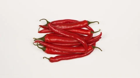 Red chili peppers. Loop motion. Top view. Stock Footage 163741228