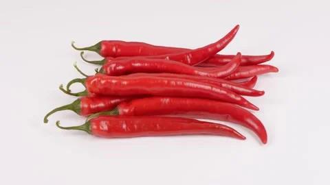 Red chili peppers. Side view. Loop motion. Stock Footage 163738971