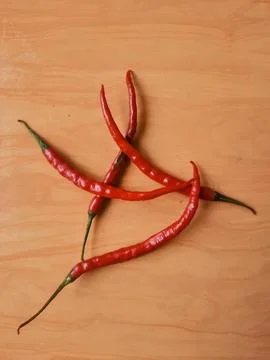 Red chilies on the table Stock Photos