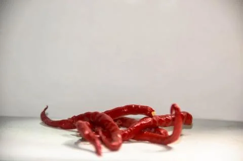 Red chilies for the white background Stock Photos