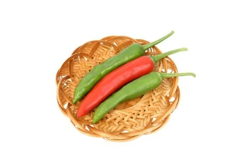 A red chilli between two green ones 库存照片