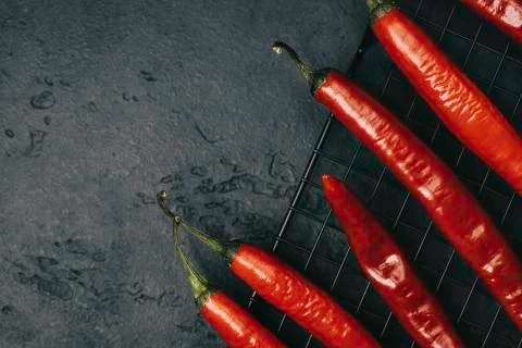 Red chilli pepper on dark background. Foto stock