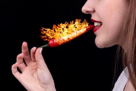 Red chilli pepper with fire and girl Stock Photos