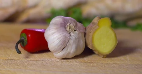 Red chilli pepper garlic and Ginger recipe ingredients eastern cuisine Video stock 77529647