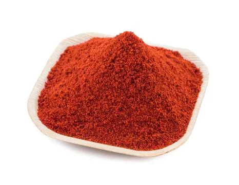 Red Chilli Pepper Powder on White Background Stock Photos