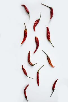 Red Chilli Peppers Pattern On White Background. Top View. Stock Photos