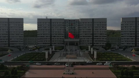 Red Chinese Flag Blowing in Wind Pull Back to Ferris Wheel and Clouds Stock Footage 205088559