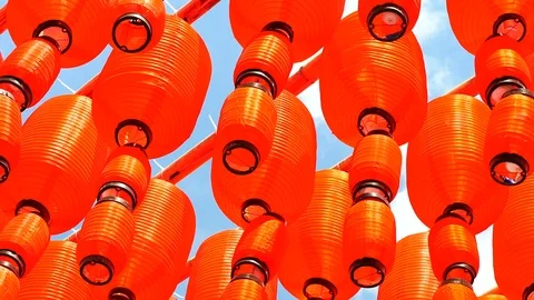 Red Chinese lantern with sky background on sunny day. The lantern is decorate Stock Footage 96321735