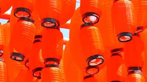 Red Chinese lantern with sky background on sunny day. The lantern is decorate Stock Footage 96321999