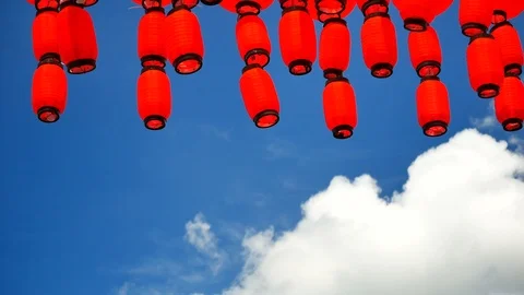 Red Chinese lantern with sky background on sunny day. The lantern is decorate Stock Footage 96322166