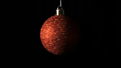 Red Christmas ball on the dark background. Christmas and new year concept. Stock Footage 144469378