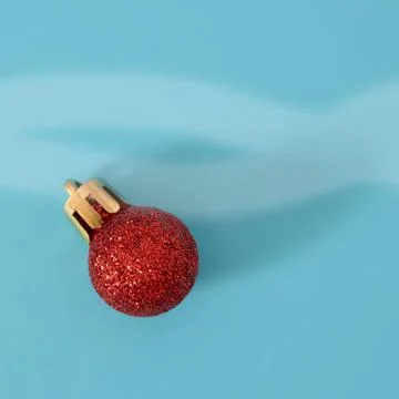 Red christmas ball patterns on solid blue background. Balls of different text Stockfoto's