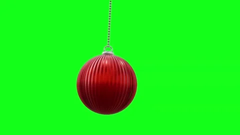 Red Christmas bauble with falling snowflakes on green screen festive background Stock Footage 320624742