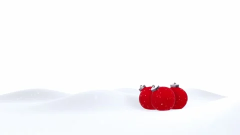Red christmas baubles in the snow loop snowfall Stock Footage 338403652