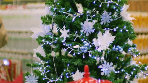 A red Christmas lantern sits in the foreground.  Stock Footage 322535529