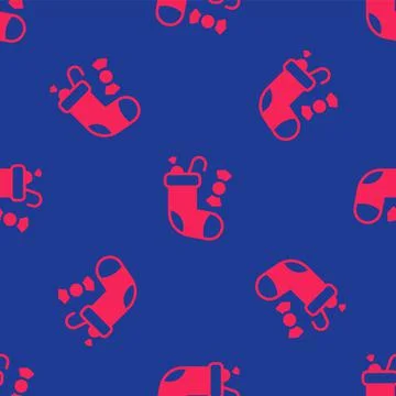 Red Christmas stocking icon isolated seamless pattern on blue background. Merry Stock Illustration