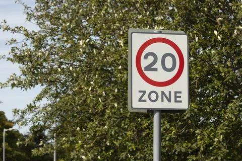 Red Circle 20mph Zone Speed Limit Road Traffic Sign in Residential Area Stock Photos