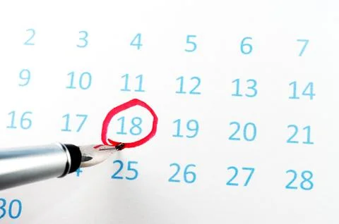 Red circle on calendar Stock Photos