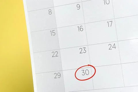 Red circle. Close up of a date 30 with red circles on a calendar.  Stock Photos