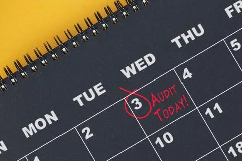 Red circle mark on the calendar at 3 for reminder of Audit Today. Stock Photos