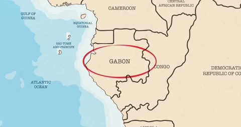 A red circle marking to gabon on a vintage political map Video stock 337432946