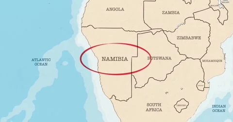 A red circle marking to namibia on a vintage political map Vídeos de archivo 337433025