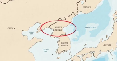 A red circle marking to north korea on a vintage political map Video stock 337433037