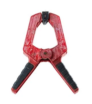 Red clamp on white background Stock Photos