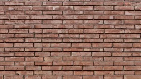 Red clay brick wall surface texture as background image. Stock Photos