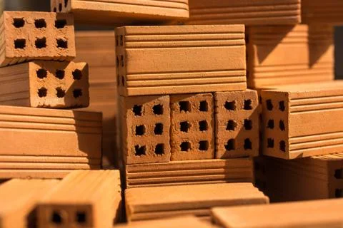 Red clay bricks close up Stock Photos