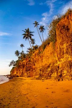 Red cliff beach or Pha Daeng in Ao Thung Sarng Bay, Chumphon, Thailand Stock Photos