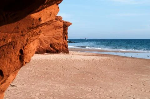 Red cliffs at dune de sud Stock-Fotos