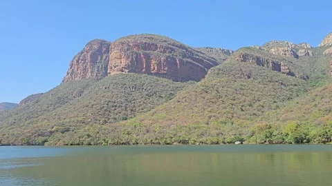 Red Cliffs over Calm Water, Blyde River Canyon, South Africa 8K Video stock 347947993