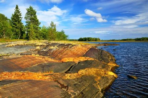 Red cliffs of the White sea Stock Photos