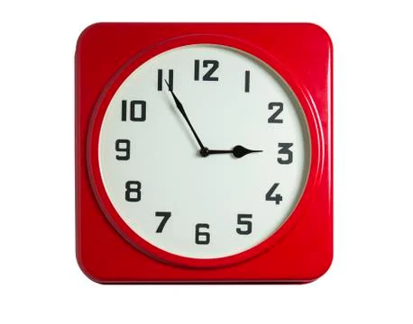 Red clock on white Stock Photos