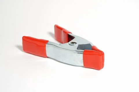 Red clothespin on a white background Foto stock